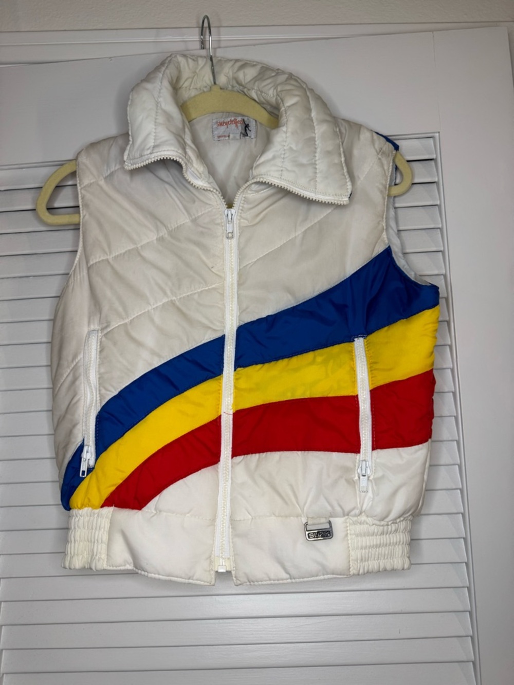 Puffer Vest with Blue, Yellow & Red Stripe Accentsy